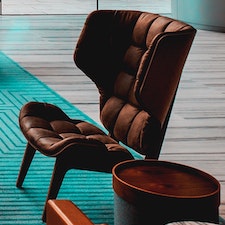 Several chairs and couches in an office lobby